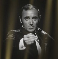 Текст и перевод песни Charles Aznavour - Les deux guitares